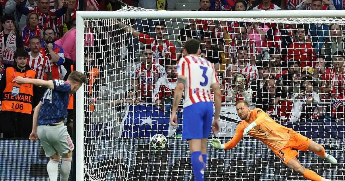 Arsenal stuns atletico, inches closer to champions league glory