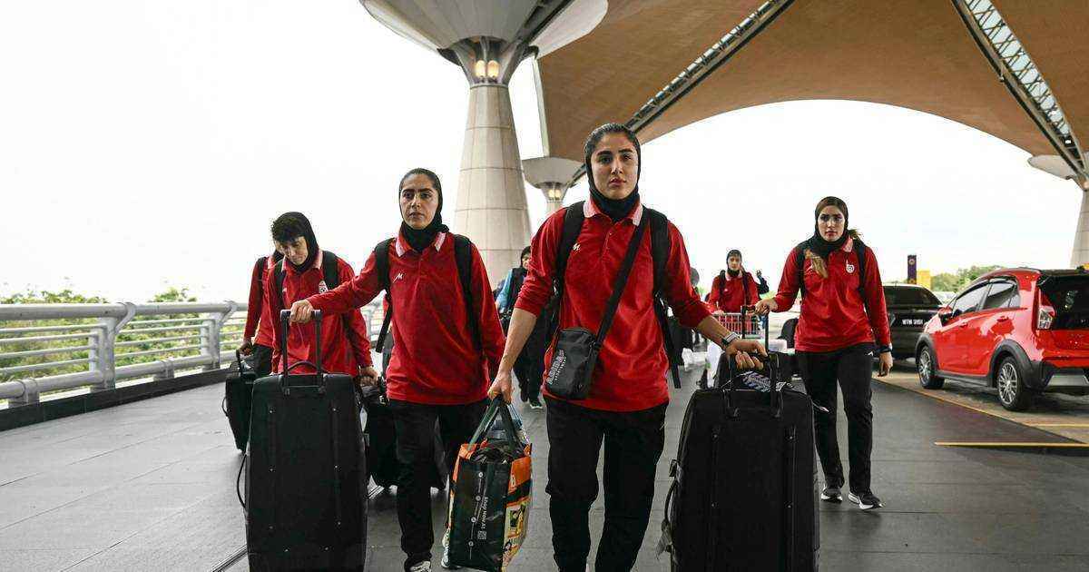 Iran women's football team returns amid asylum uncertainty